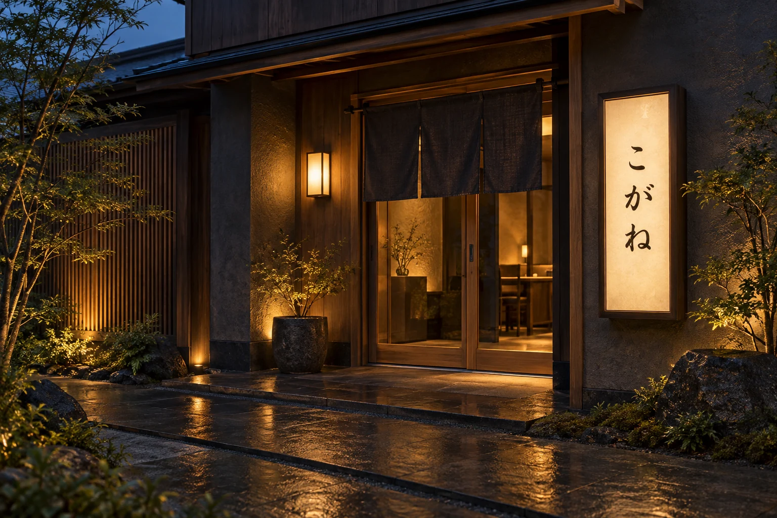 こがねの灯りがともる店舗入口